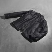 
Button & Hem Craftsmanship Construction Detail on Austere Matte Fekete Bőr Motoros Dzseki Férfi