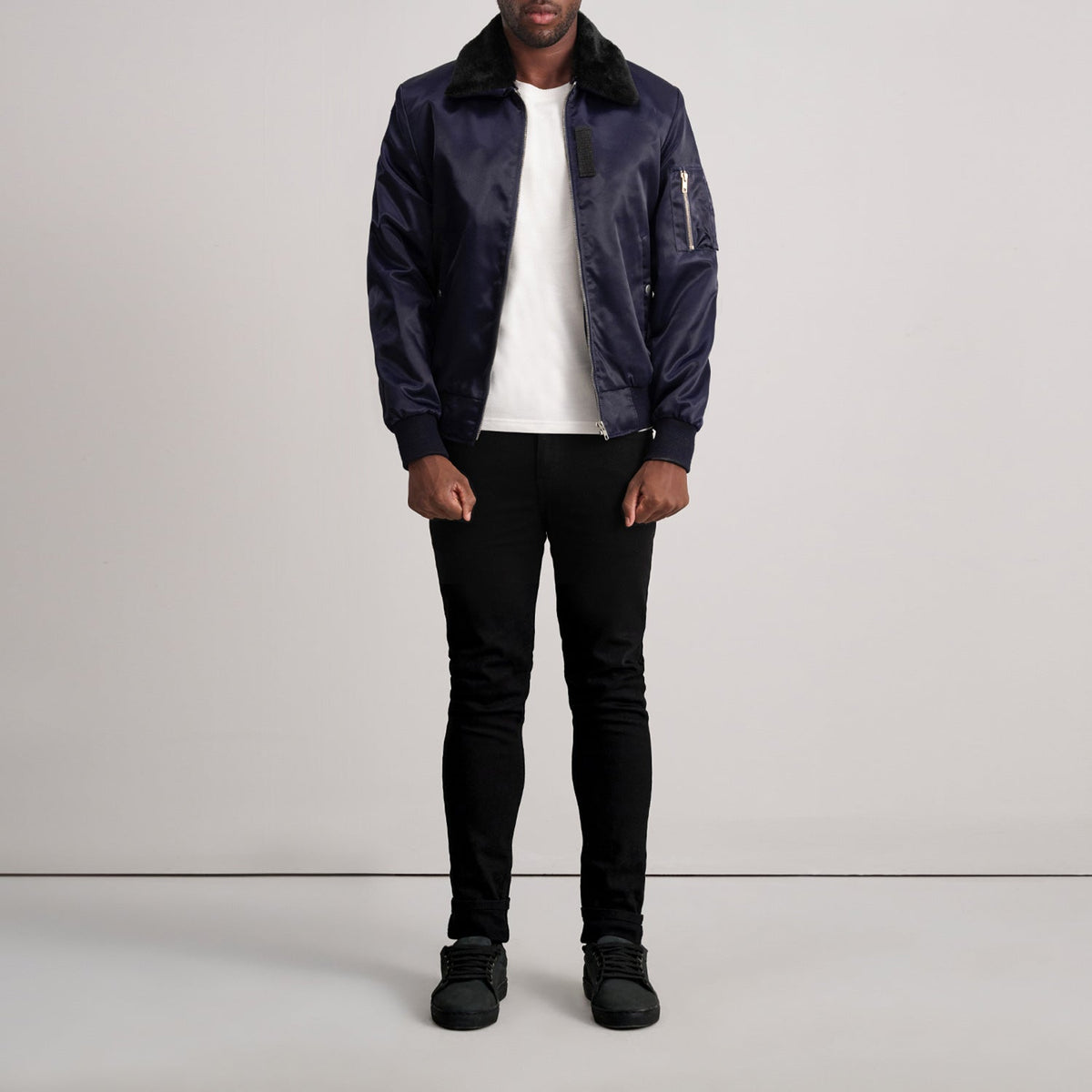 Close-Up Detail of Removable faux fur collar &amp; Zipper Hardware on Clyde B-15 Blue Bomber Jacket