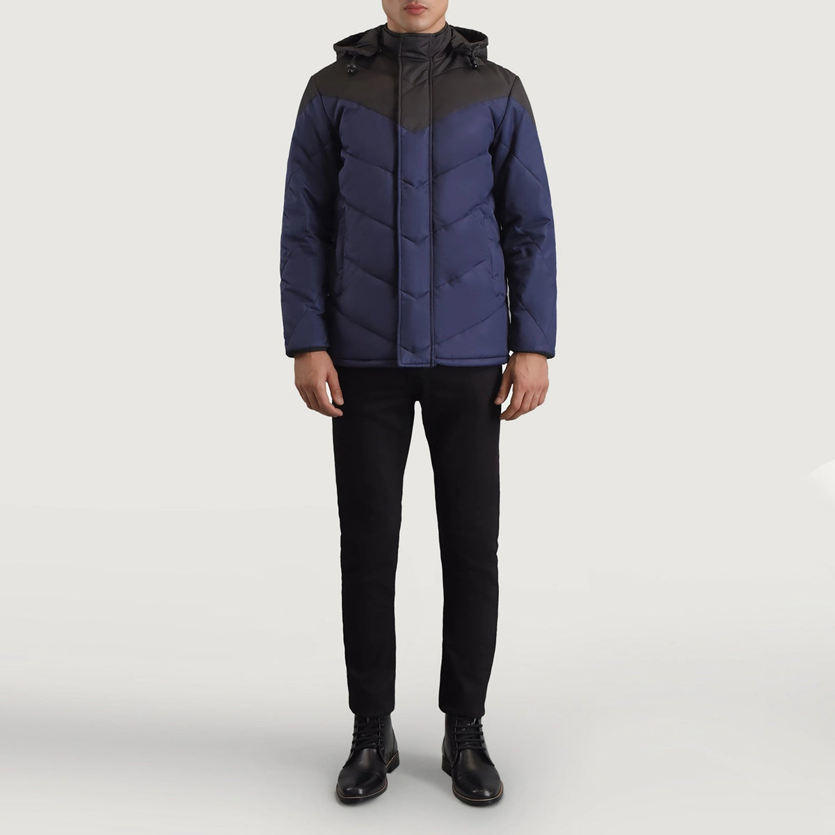 
Luka Fekete & Kék Hooded Puffer Bőrdzseki Férfi - Oldalnézet az ergonomikus ujjkialakítással