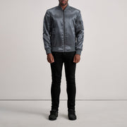 Close-Up Detail of Varsity &amp; Zipper Hardware on Quinton MA-1 Grey Bomber Jacket